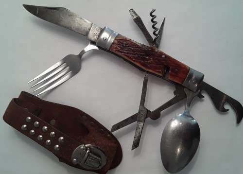A  vintage multi-tool utility knife with original pouch.  Awesome!!!