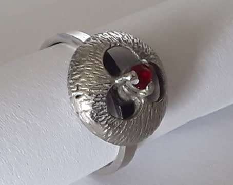 A rare Brittania solid silver and ruby Modernist design ring.  Superb!!!