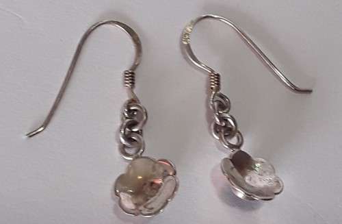 A gorgeous pair of solid silver earrings with flower motif.  Superb!!!