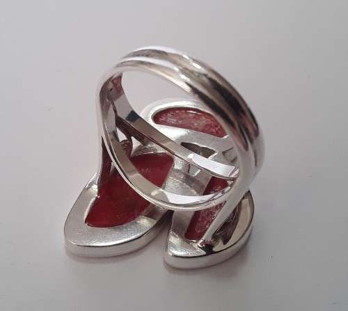 A beautifully designed, sterling silver ring with stunning red stones.  Wow!!!