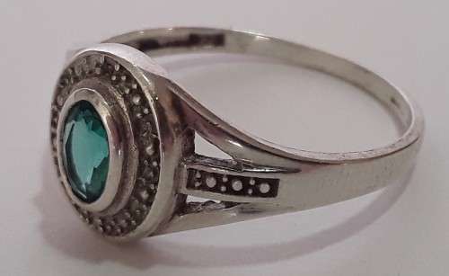 A vintage solid sterling silver ring with a sea-green faceted stone. *R1 bid!!!*