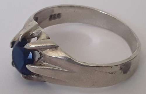 A vintage solid sterling silver `claw` ring with faceted blue stone.  *R1 bid!!!*