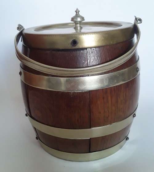 Antique oak tobacco jar in the form of a French wine barrel.  Ceramic interior.