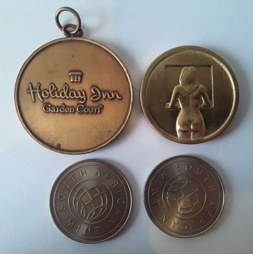 A lot of 4 x South African medallion and tokens.  1 bid takes all!