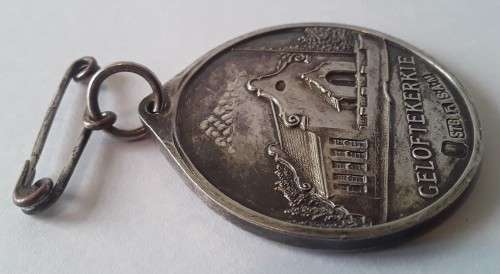 Rare solid silver Andries Pretorius `Gelofte Kerk` medal.