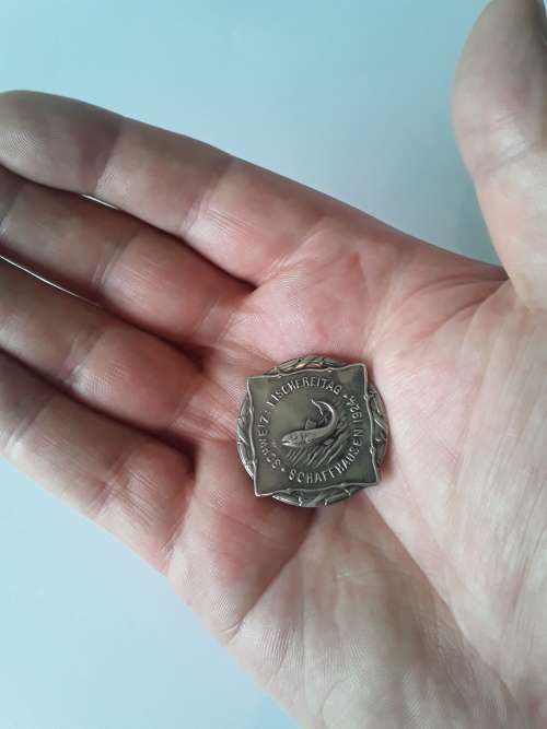 Swiss 1924 solid silver Schaffhausen Fishing Day badge by `Jezler`