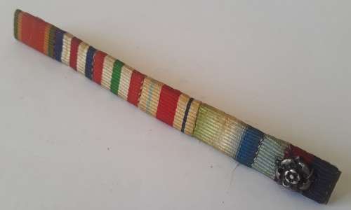 WW2 ribbon bar with silver rosette clasp. Pin intact.
