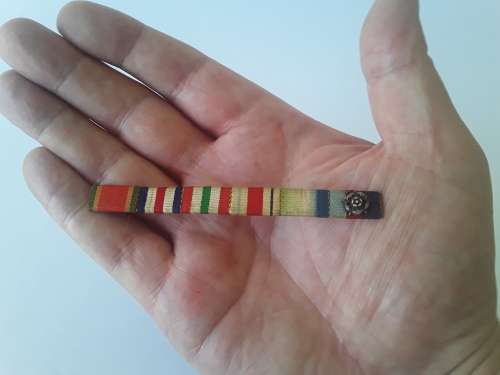 WW2 ribbon bar with silver rosette clasp. Pin intact.