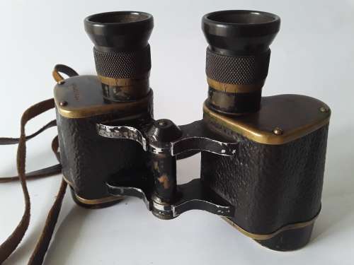 Rare WW2 British RAF `Air Ministry` binoculars by Wray, London in original fitted leather case.