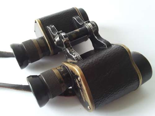 Rare WW2 British RAF `Air Ministry` binoculars by Wray, London in original fitted leather case.