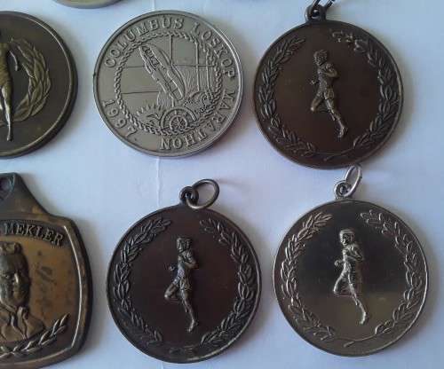 Collection of various vintage running medals.  1 bid takes all!