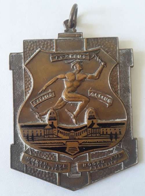 Vintage `North Transvaal Athletics / Noord Transvaal Atletiek` medallion.