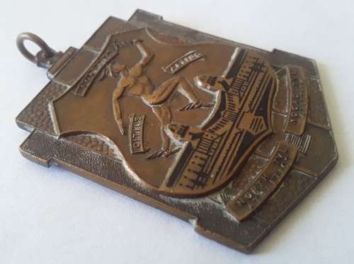 Vintage `North Transvaal Athletics / Noord Transvaal Atletiek` medallion.