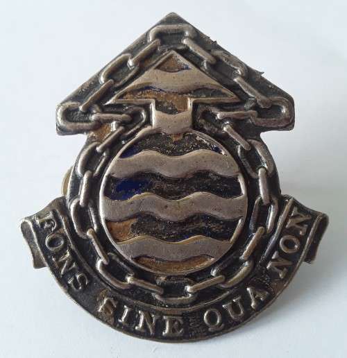 South Africa Ordnance Corps Cap Badge. Lugs intact.