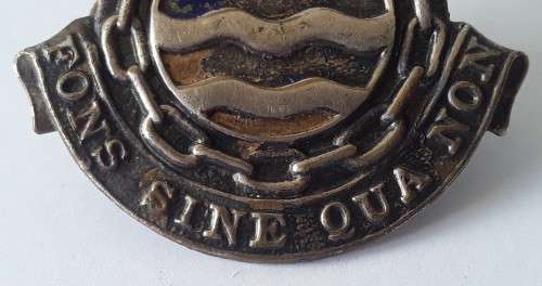 South Africa Ordnance Corps Cap Badge. Lugs intact.