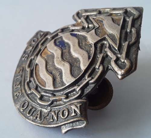 South Africa Ordnance Corps Cap Badge. Lugs intact.