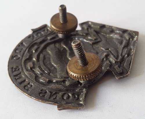 South Africa Ordnance Corps Cap Badge. Lugs intact.