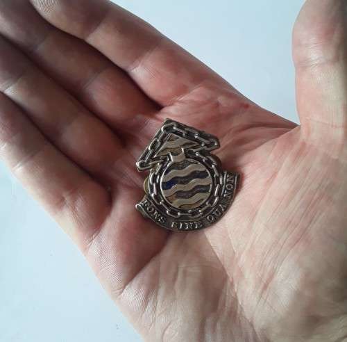 South Africa Ordnance Corps Cap Badge. Lugs intact.