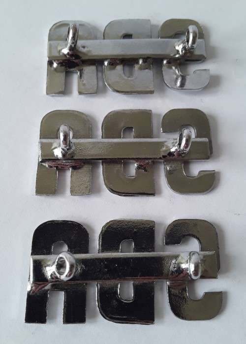 3 x SBA metal shoulder titles. Lugs intact.