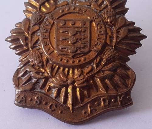 South African Army Service Corps `ASC/ADK` collar badge. Pins intact.