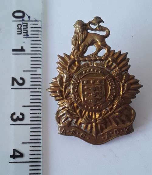 South African Army Service Corps `ASC/ADK` collar badge. Pins intact.