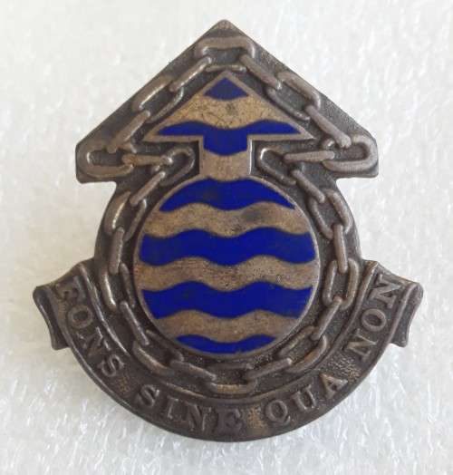 SADF Ordinance Service Corps Cap Badge. Lugs intact.