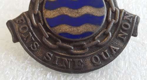 SADF Ordinance Service Corps Cap Badge. Lugs intact.