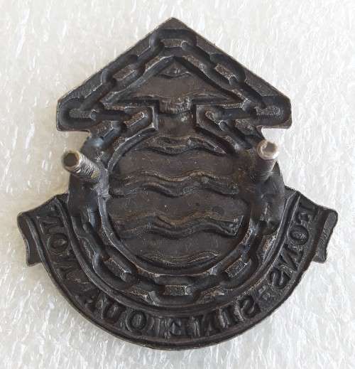 SADF Ordinance Service Corps Cap Badge. Lugs intact.