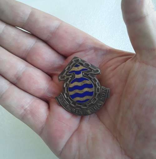 SADF Ordinance Service Corps Cap Badge. Lugs intact.