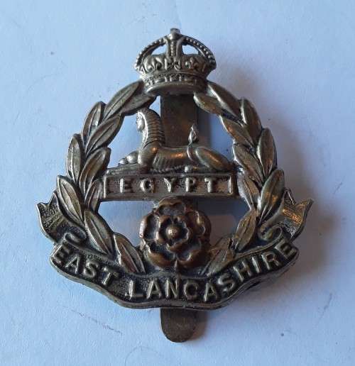 WW1 East Lancashire Regiment Cap Badge. Slide intact.
