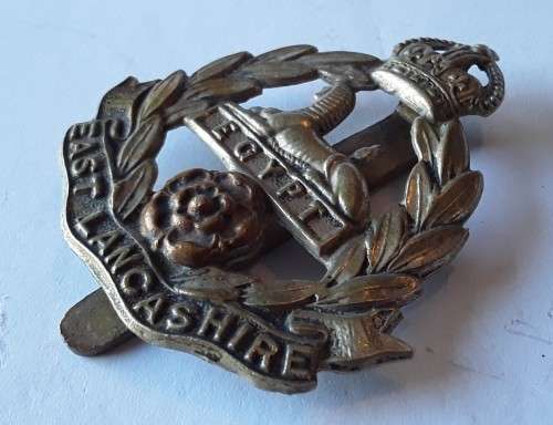 WW1 East Lancashire Regiment Cap Badge. Slide intact.