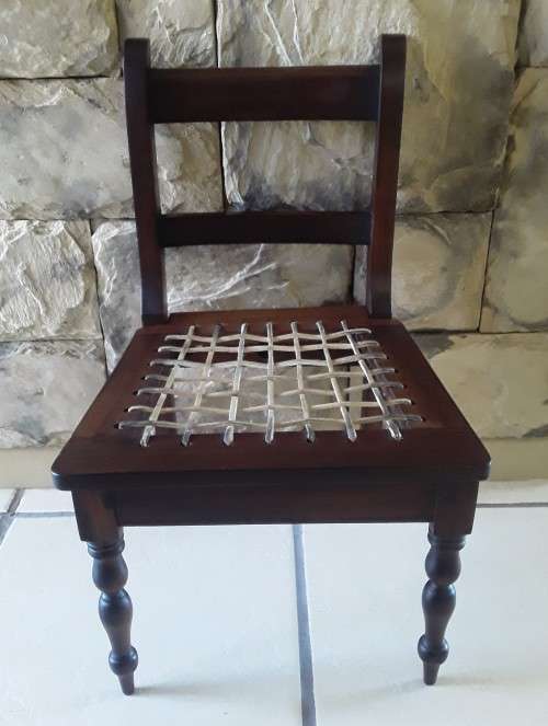 "Reserved". Superb Antique Cape Stinkwood Child`s Riempie Chair. 54,5 cm High.