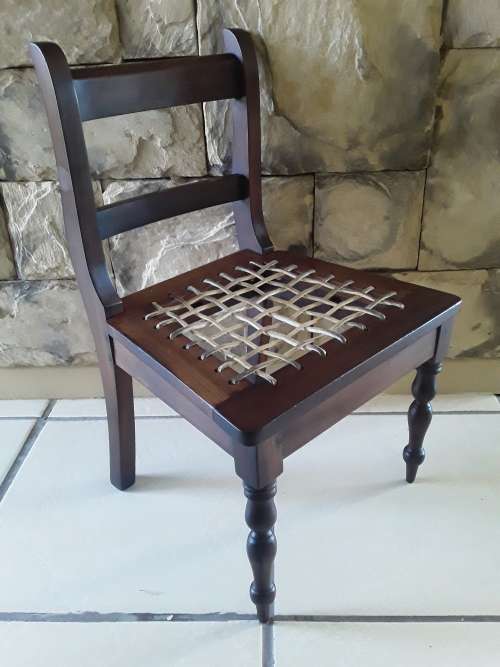 "Reserved". Superb Antique Cape Stinkwood Child`s Riempie Chair. 54,5 cm High.