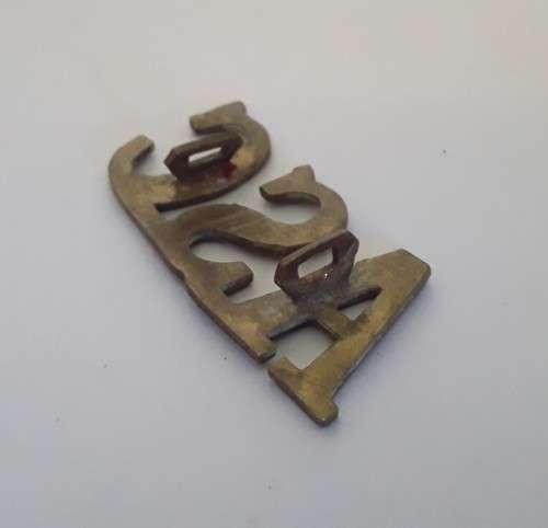 WW1 British Army Service Corps Brass Shoulder Title.  Lugs Intact.