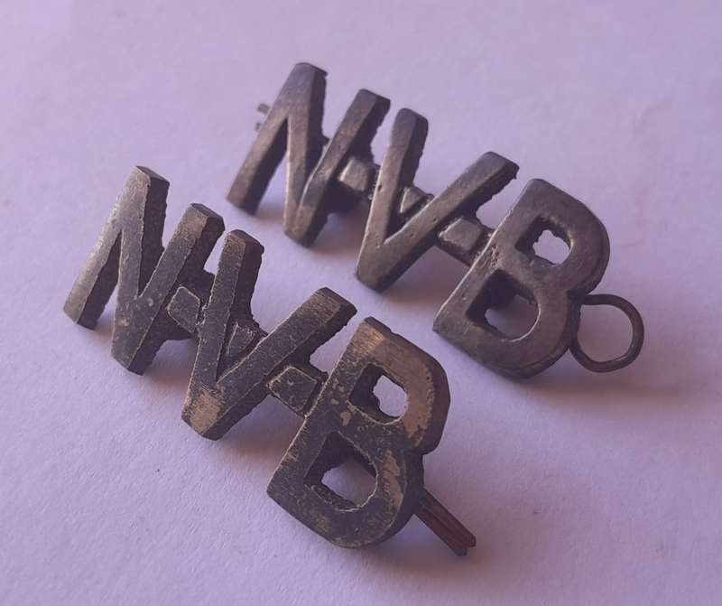 Pair SA WW2 National Volunteer Brigade Shoulder Titles.  Lugs Intact.