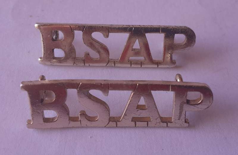 Pair Rhodesia BSAP (British South African Police) Shoulder Titles. Lugs intact.