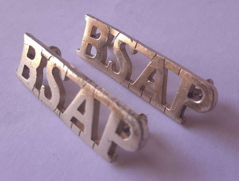 Pair Rhodesia BSAP (British South African Police) Shoulder Titles. Lugs intact.