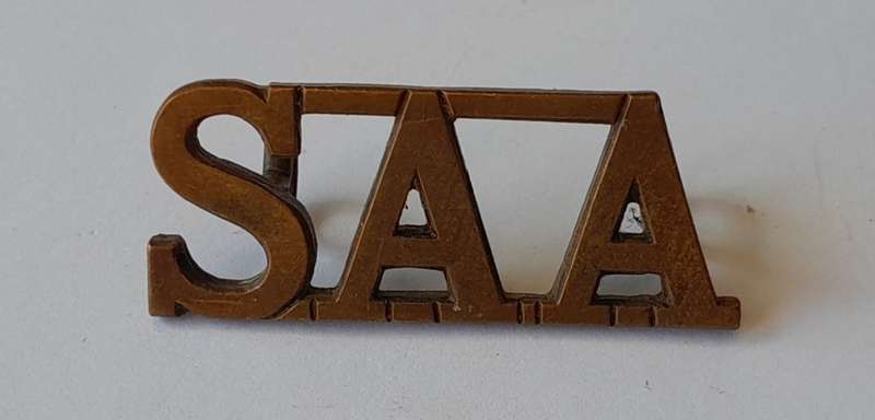 South Africa Army Artillery Brass Title. Lugs Intact.