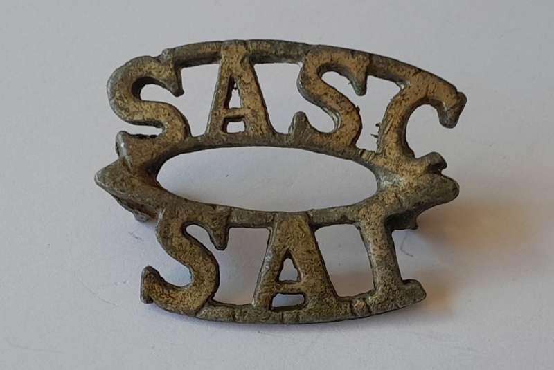 South Africa Service Corps Brass Title. Lugs Intact.