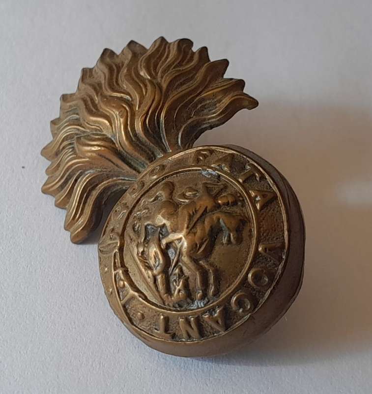 Early Northumberland Fusiliers Badge. Lugs Intact..