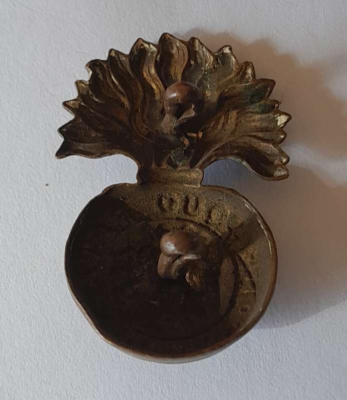 Early Northumberland Fusiliers Badge. Lugs Intact..