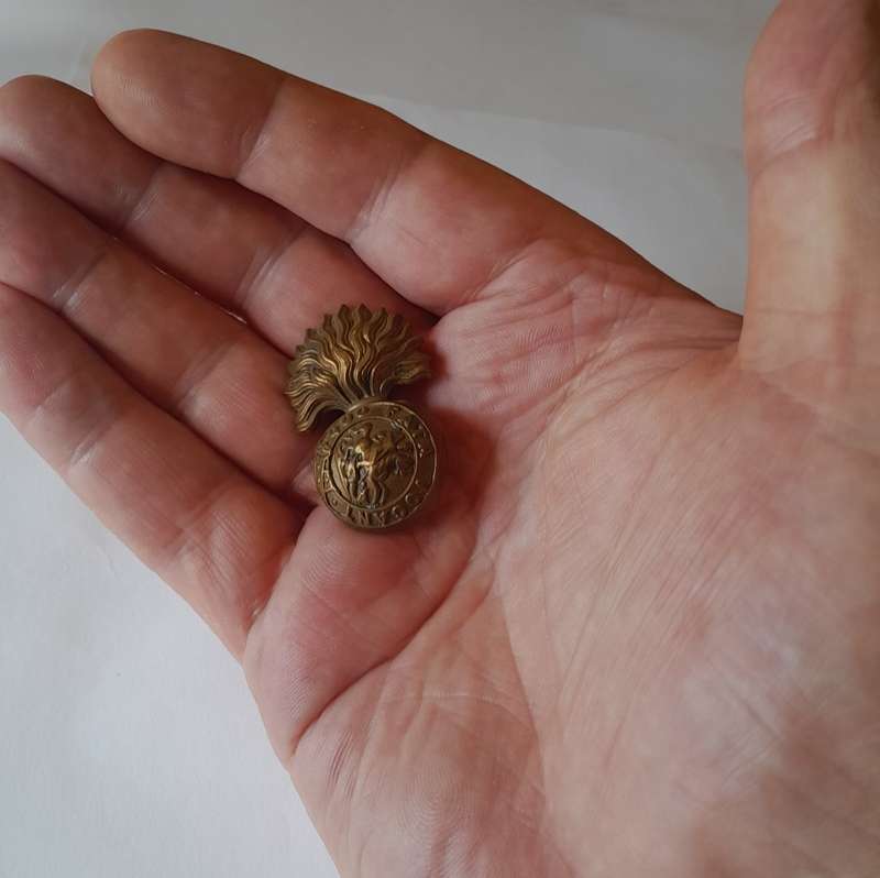 Early Northumberland Fusiliers Badge. Lugs Intact..