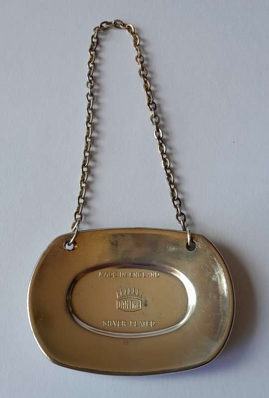 A Vintage Silver Plated `BRANDY` Bottle Decanter Label By `Ianthe, England`.