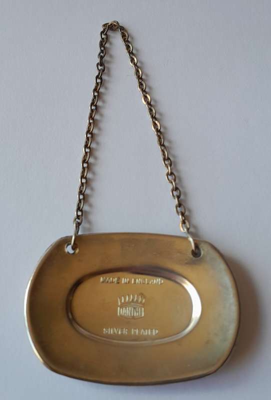 A Vintage Silver Plated `SHERRY` Bottle Decanter Label By `Ianthe, England`.