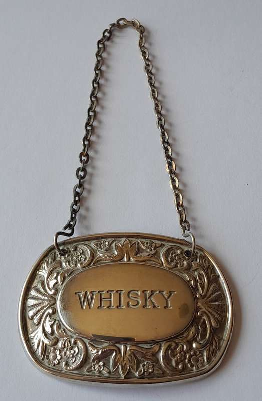 A Vintage Silver Plated `WHISKY` Bottle Decanter Label By `Ianthe, England`.