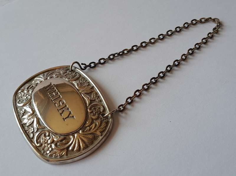 A Vintage Silver Plated `WHISKY` Bottle Decanter Label By `Ianthe, England`.