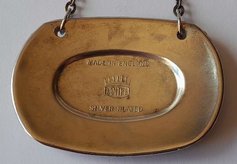 A Vintage Silver Plated `WHISKY` Bottle Decanter Label By `Ianthe, England`.