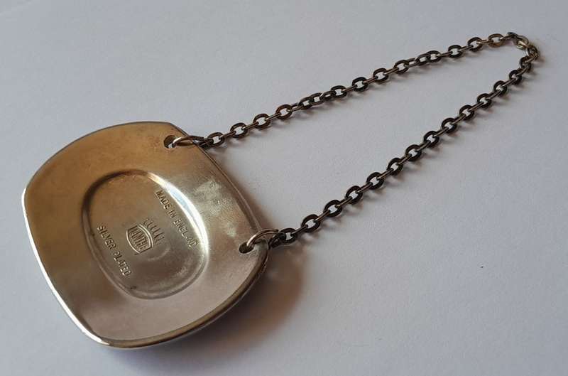 A Vintage Silver Plated `WHISKY` Bottle Decanter Label By `Ianthe, England`.