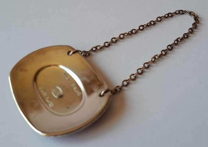A Vintage Silver Plated `WINE` Bottle Decanter Label By `Ianthe, England`. (2 of 2)