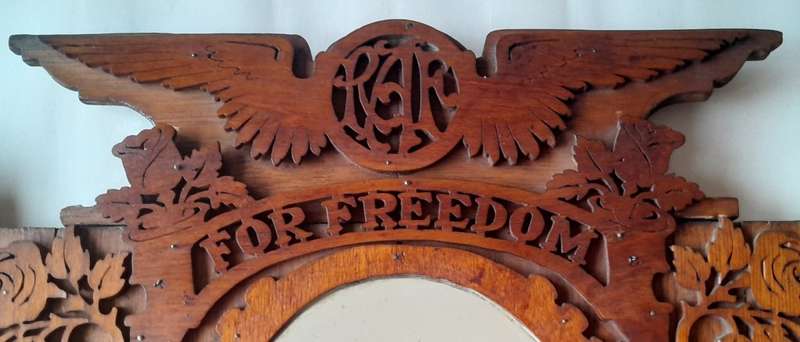 WW2 Hand Carved Oak And Walnut Hanging Mirror Wall Display. Dated 1939. 67 x 50 cm.